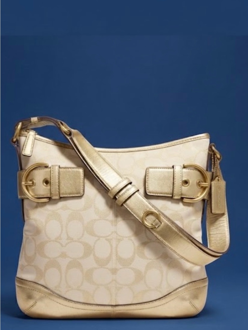 Coach signiture bagGold and Cream Women's Bag